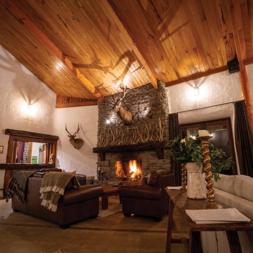 Kuranui Lodge Stone Fireplace Kuranui Lodge's grand stone fireplace in the main living area.