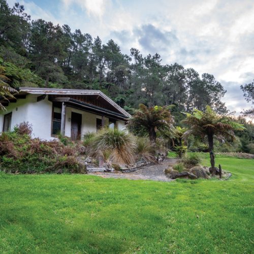 Kuranui Private Villas Exterior Exterior view of Kuranui Private Villas amidst natural surroundings.